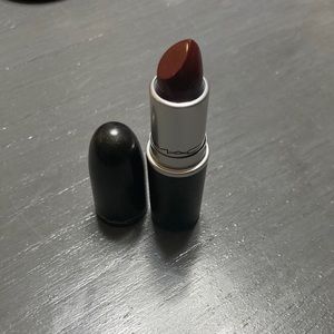 Mac cosmetics, discontinued lipstick in color heavy petting